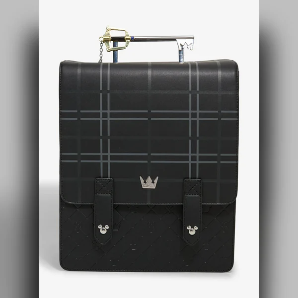 Front view of the Loungefly plaid Keyblade mini backpack